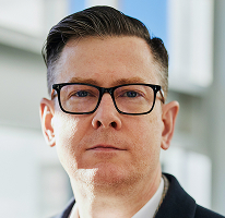 Alexander Hughes, CEO en directeur van een crypto trading bedrijf, portret